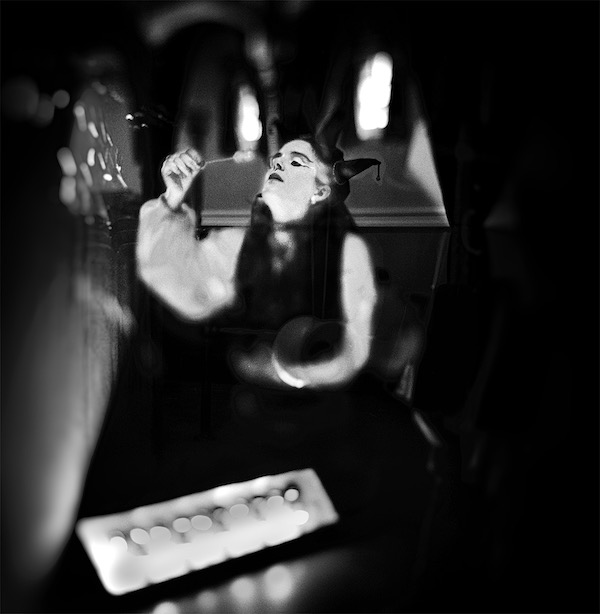 tinker blowing bubbles on stage 